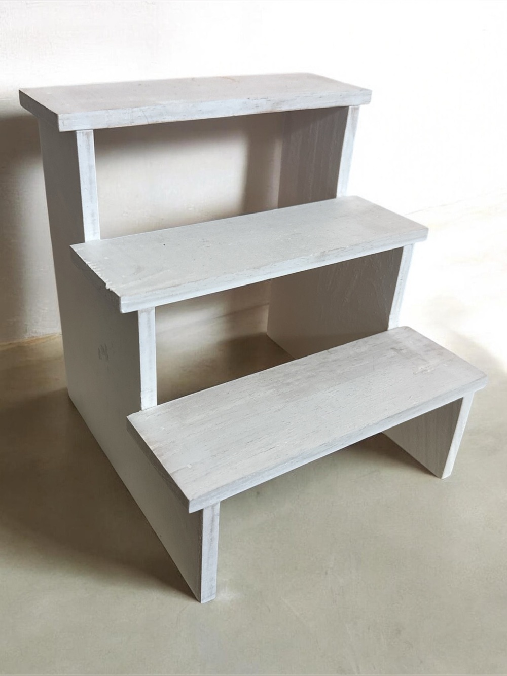Minimalist White Wood Step Display with Open Shelves